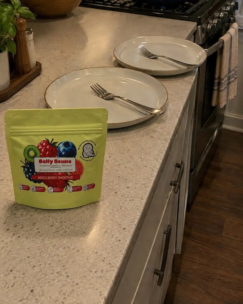 Belly Beans pouch on the kitchen counter next to the supper plates